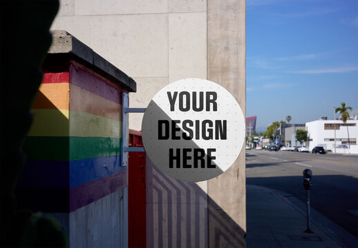 Mockup Of Customized round sign outside building