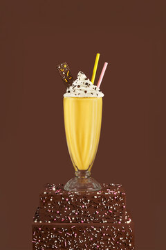 Vanilla milkshake with whipped cream and chocolate decoration