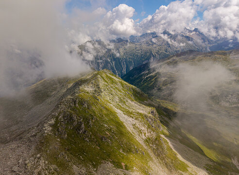Misty alpine ridge in Sportgastein, Austria wilderness