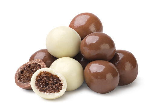 Pile of chocolate balls and halves close-up on a white. Isolated