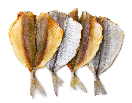Dried striped fish on a white background. Top view