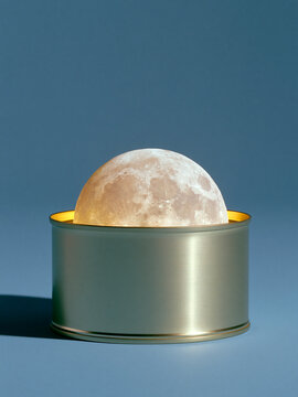 Surreal moon rising from an open canned food container