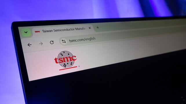 Computer screen displaying TSMC logo and official website homepage in web browser.