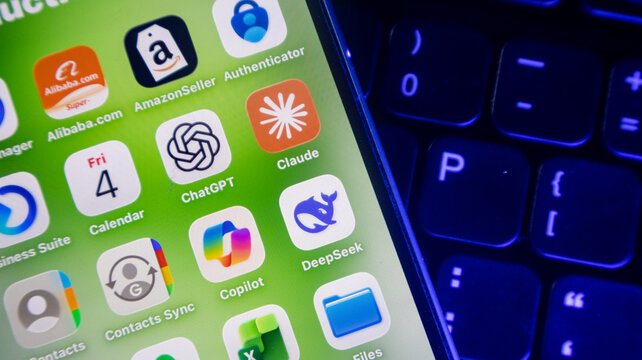 AI mobile applications showing ChatGPT Claude DeepSeek and Copilot icons on smartphone screen.