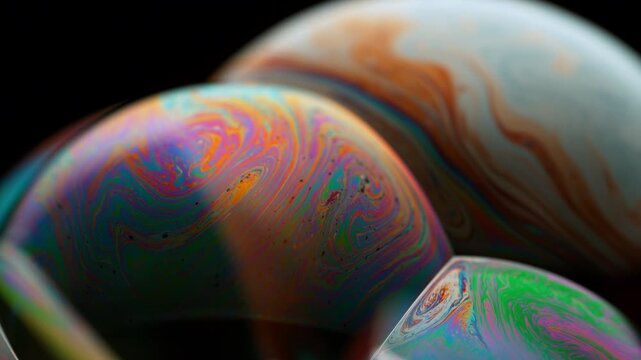 Detail of Soap Bubbles with Swirling Colorful Patterns in Super Slow Motion at 1000 fps.