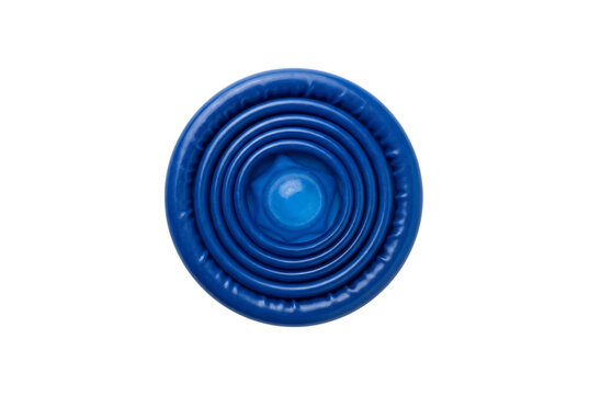Blue rolled condom viewed from above showing latex ring for contraception protection and safe sex isolated on a transparent background