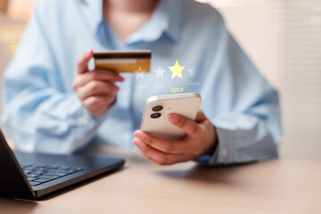 Customer loyalty program membership reward and premium status upgrade. Woman hands holding...