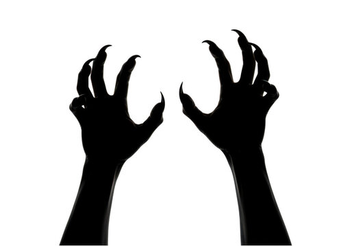 Black silhouette of scary monster hands with sharp claws reaching forward