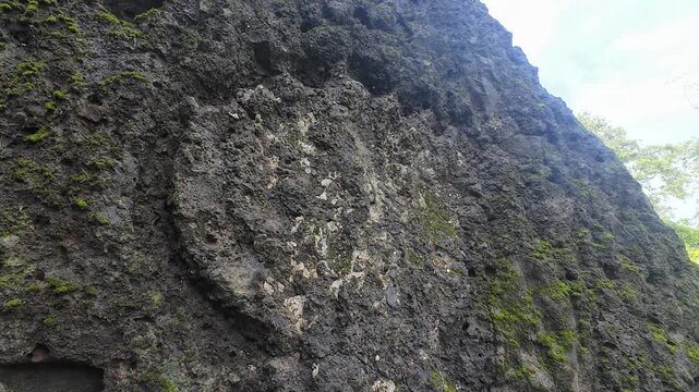 Close Up of Eroded Serpent Naga Relief Relief Carved on Outdoor Rock Surface at Mahakali Caves