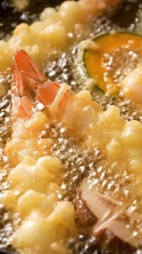 Deep Frying Shrimp Tempura and Vegetables in Hot Bubbling Oil, Delicious Authentic Asian Food