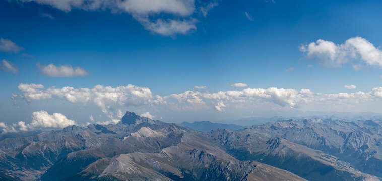 French Alps aerial landscape with Monviso peak in background, near Aiguilles,  France, Italy