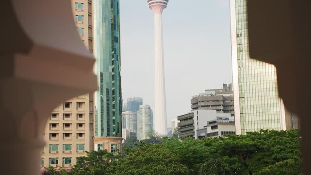 Kuala lumpur tower and cityscape view from balcony