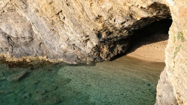 Video of Little Cave Beach near Karavostasi beach on Bali mediterranean resort, Crete, Greece.