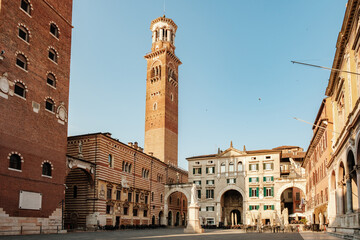 Obraz premium Exploring the historic architecture of Verona, Italy under a clear blue sky