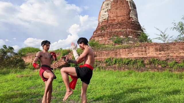 Traditional Muay Boran Fighters Sparring at Ancient Ayutthaya Temple Ruins