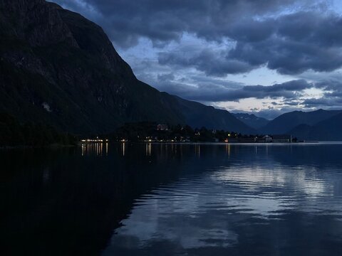 Twilight reflections on tranquil Norwegian fjord waters near &Aring;ndalsnes, M&oslash;re og Romsdal, Norway, August 2025