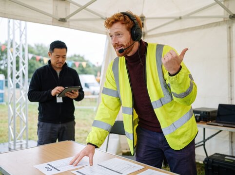 Generative AI, Event crew coordinator managing an outdoor festival setup