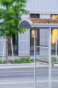 Public transport stop shelter stands beside modern architecture in Nordbahnviertel Vienna Austria showing street infrastructure within a contemporary neighborhood