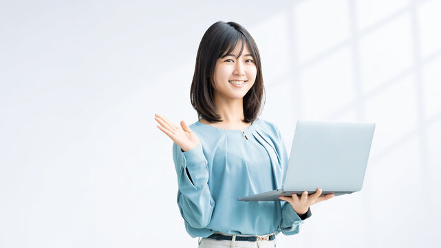 ノートパソコンを持つ女性・ビジネスウーマン, Businesswoman Holding a Laptop