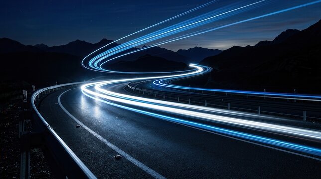 Modern transportation and urban mobility featuring abstract speeding car light trails on a highway at night.