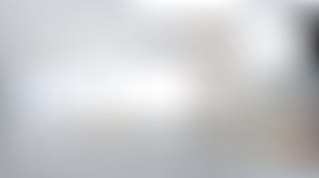 Abstract soft grey gradient background with smooth light blur and clean minimalist texture.