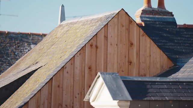 Close-up of traditional rooftops with wood and slate detail in Montrichard, France