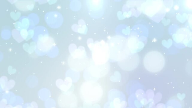 ライトブルー背景に舞い散るハート型のボケとキラキラ輝く光のシームレスループ動画素材 / Glowing heart bokeh and sparkling light loop on light blue gradient background