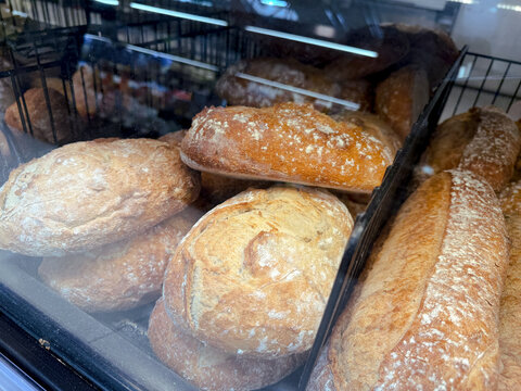 Freshly baked artisan bread loaves on display