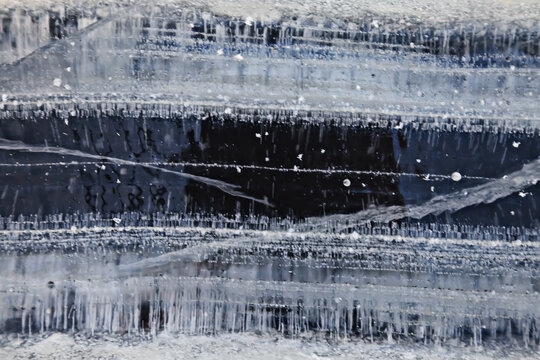 Ice natural texture cracks and chips on ice