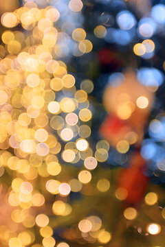 Golden New Year bokeh, abstract background with blurred circles.