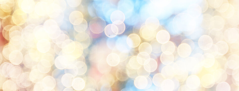 Golden New Year bokeh, abstract background with blurred circles.