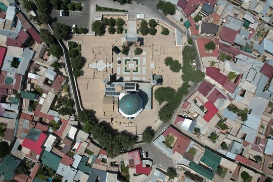 Drone footage of the Gure Amir Mausoleum and its surroundings in the city of Samarkand, Uzbekistan.