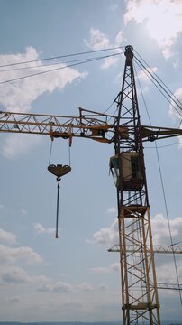 Tower crane against blue sky