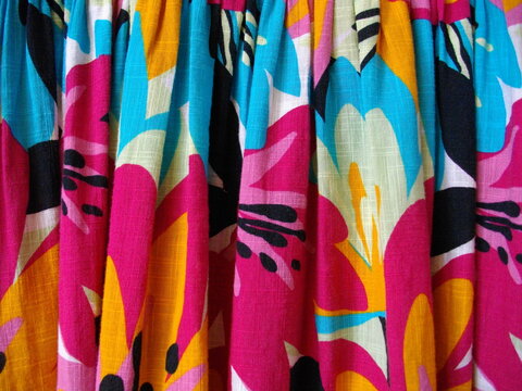 Fabric background and texture featuring Latin American style colors. Clothing and fashion of the peoples of Mexico and Latin America.