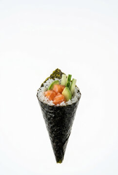 Fresh salmon and avocado temaki sushi hand roll on a white background