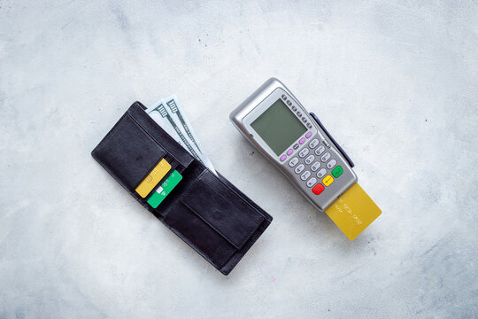 Cashless payment lifestyle - credit card, wallet and POS terminal, modern personal finance, flat lay top view