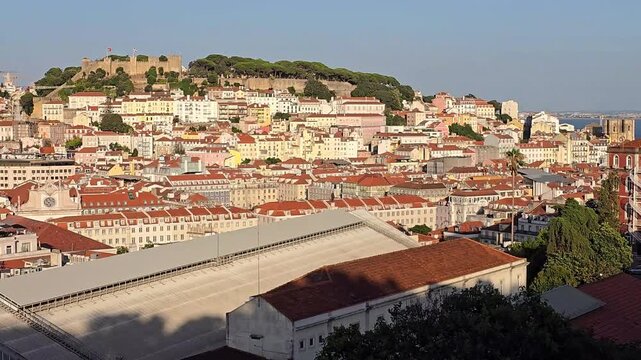 View of the city of Lisbon with the Saint George Castle (Sao Jorge Castle) and the Tagus river in the background