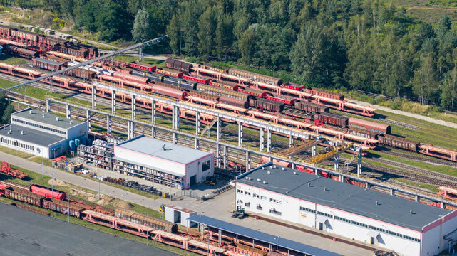 Aerial view of a large railway marshalling yard with industrial buildings