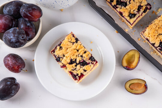 Traditional German Zwetschgenkuchen, plum open crumble pie