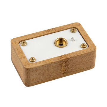 Bamboo wooden box with white panel and brass hardware. Portable organizer with gold screws and chrome stud. Handcrafted nature-style container detail. Portable memory card reader housing. Rustic