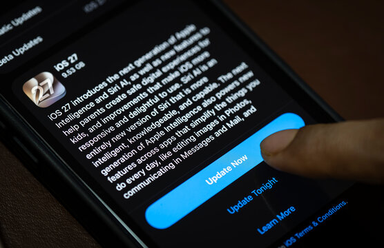 In this photo illustration, Update Now button on an iPhone displaying the iOS 27 software update screen