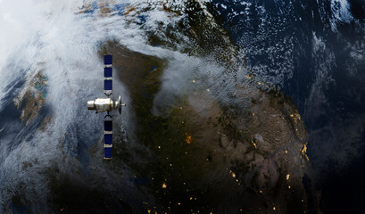 Satellite in Space, and earth,3D illustration. © Mikael Damkier