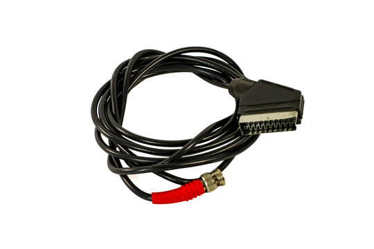 Analog video connection cable featuring a SCART connector and BNC plug, coiled and isolated on white.