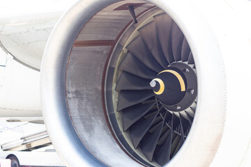 jet engine of airplane. Close up front view of the turbine of a jet engine, an airplane at the airport.  © Luis