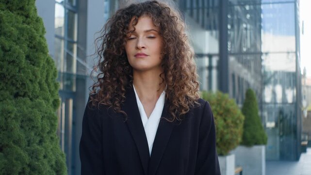 Close up confident Caucasian business woman shaking head no disagree disappointed in city serious displeased businesswoman female girl professional specialist expressing negative wrong answer outdoor