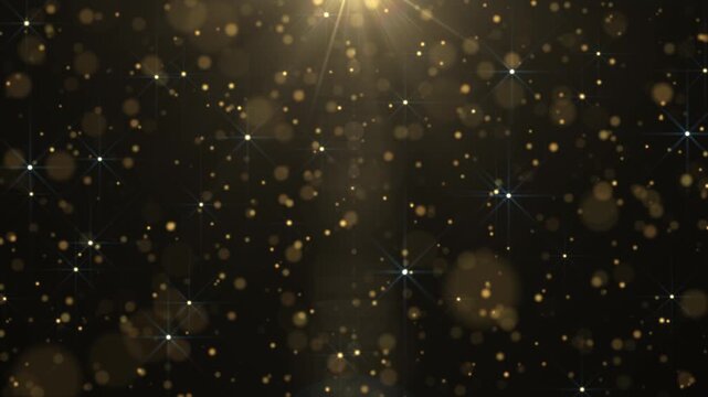 Abstract luxury golden bokeh background featuring sparkling particles, radiant starbursts, and warm glowing light, creating an elegant festive atmosphere glamour, and premium visual appeal.