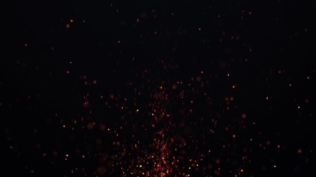 Abstract orange ember particles rising through a dark background, creating a dramatic fiery atmosphere with glowing sparks. Flying sparks and coals from a fire. abstract glowing particles 
