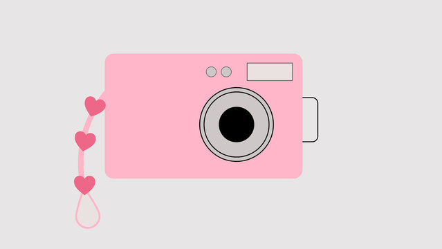 Cute Pink Camera with Heart Strap on Light Gray Background