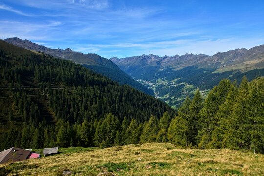 Austrian Alps - view of the Versingalpe hut and the valley Paznaun near village See