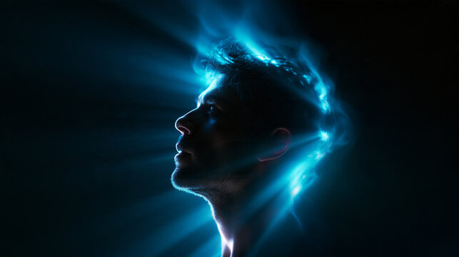 Silhouette of Man Head with Glowing Blue Energy Concept